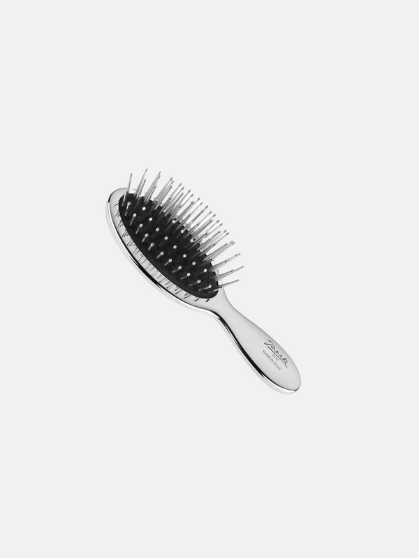 Air- cushioned handbag brush in silver